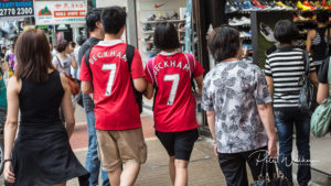 Pete walker Photography, Chinese couple in matching Manchester united shirts with Beckham on the Back